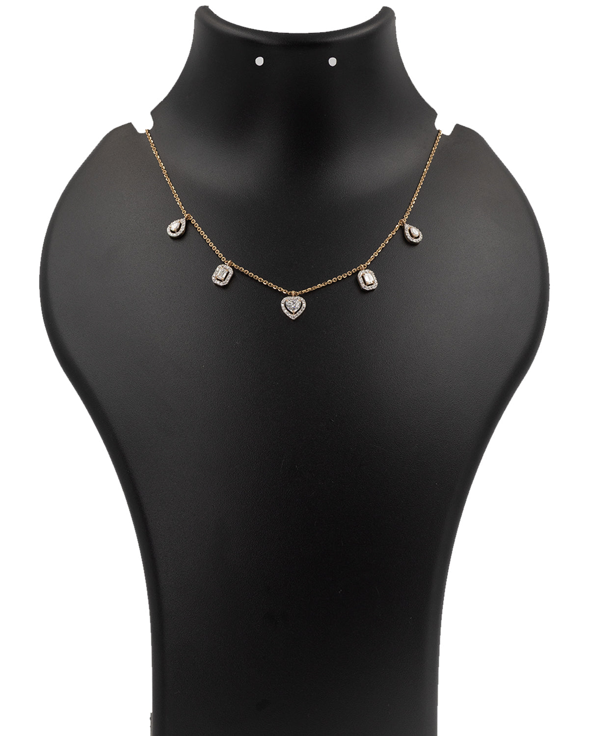 Gold necklace with heart-shaped pendants on a black mannequin bust.