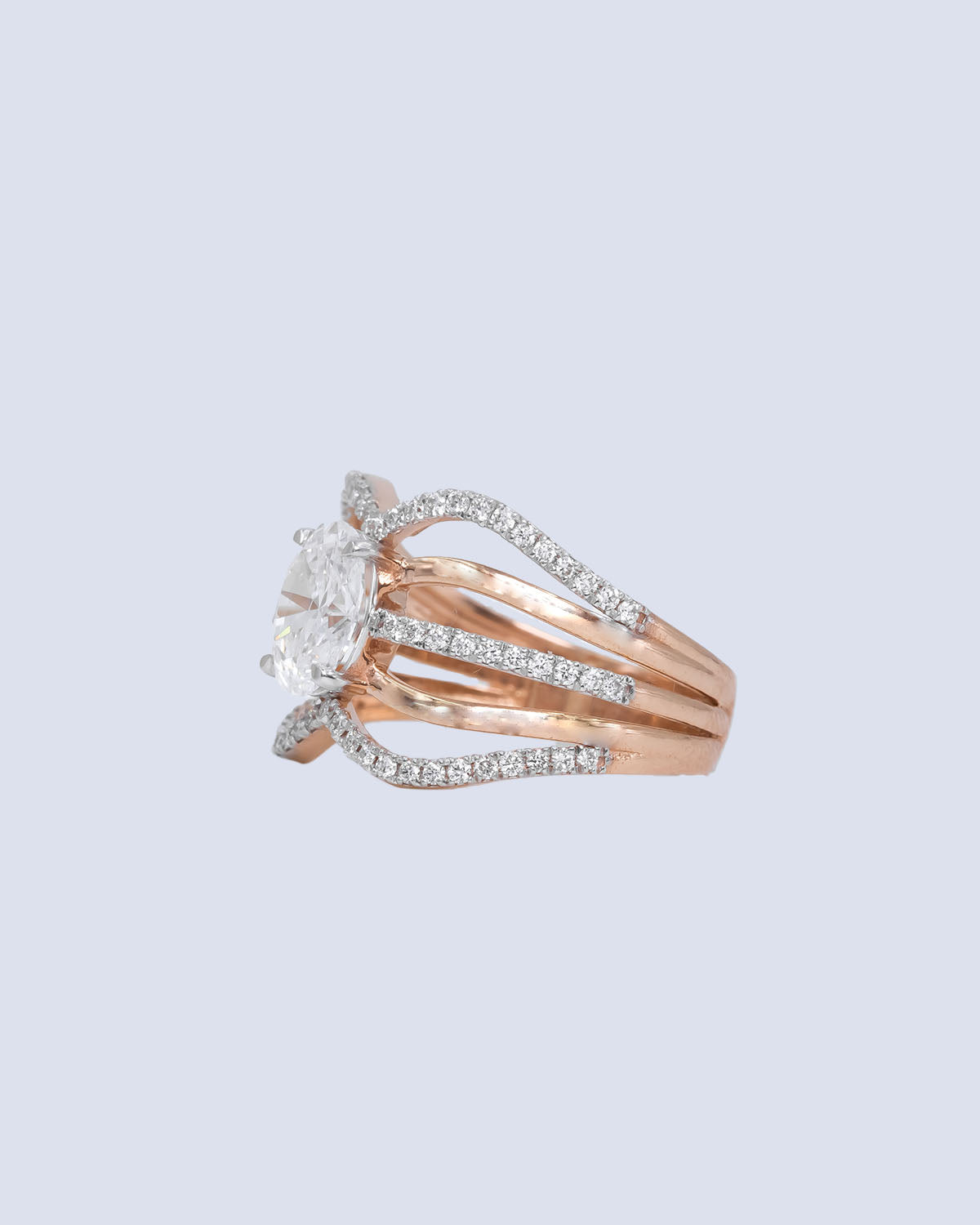 1.05 Ct Lab Grown Oval Diamond Solitaire Ring with Wave Multi-Strand Pavé Shank in 14K Two-Tone Gold