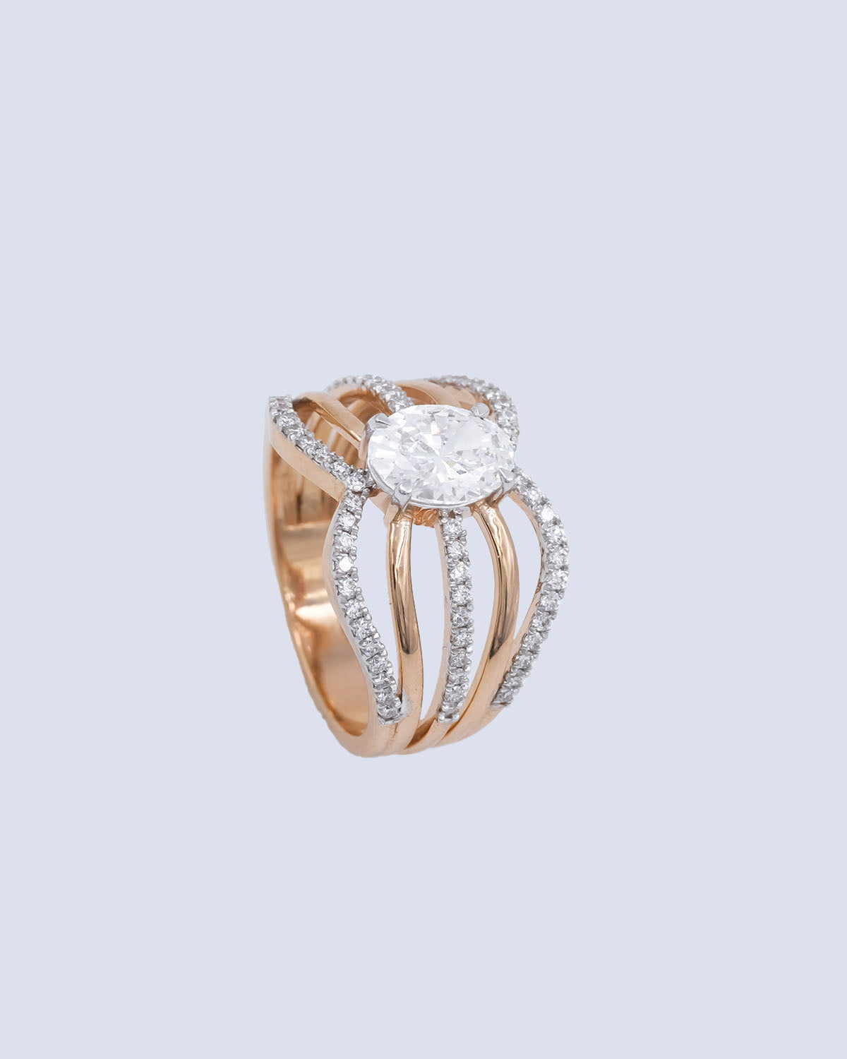 1.05 Ct Lab Grown Oval Diamond Solitaire Ring with Wave Multi-Strand Pavé Shank in 14K Two-Tone Gold